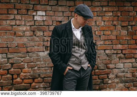Portrait Of A Man In Retro Style. Peaky Blinders. Vintage.