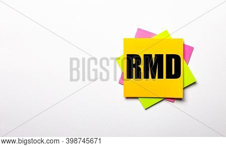 On A Light Background - Bright Multicolored Stickers With The Text Rmd. Copy Space