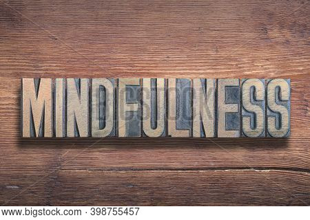 Mindfulness Word Combined On Vintage Varnished Wooden Surface