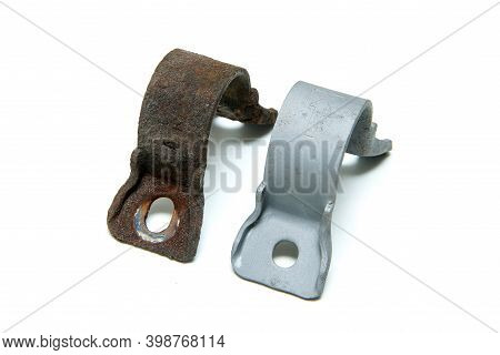 The Overgrown Rusty Cast Iron Part Compared With The Same Sand Blasted Part Isolated In A White Back