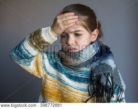 A Little Girl Has Flu, Her Head Hurts.