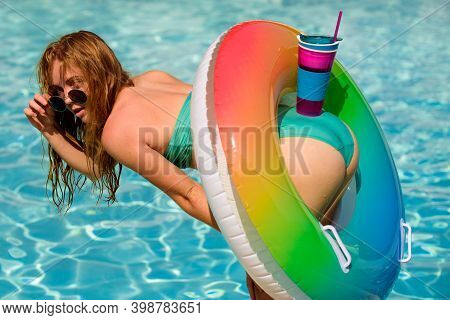 Sexy Summer Cocktail. Gorgeous Young Woman Posing In Bikini Near Pool. Female Ass In Jeans Stripped.