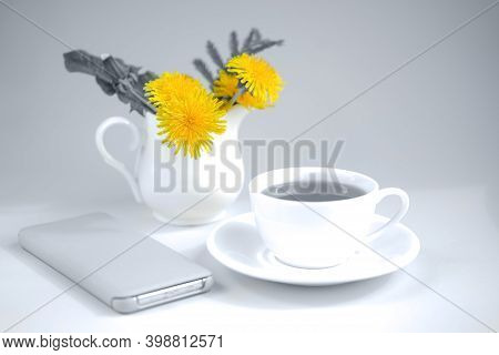 Morning Tea With Bouquet Of Yellow Spring Dandelion Flowers. Beautifully Styled Feminime Elegant Whi