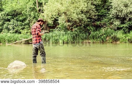 River Lake Lagoon Pond. Trout Farm. Fish Farming Pisciculture Raising Fish Commercially. Fisherman A