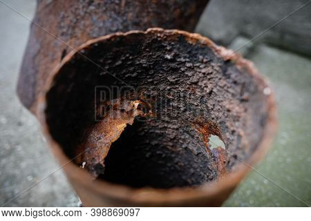 Shallow Depth Of Field (selective Focus) Image With A Very Rusty Metal Pipe.