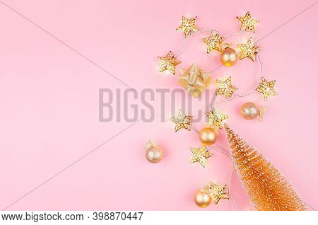 Christmas Bright And Gentle Background With Glitter Gold Decorations, Christmas Tree, Lights On Eleg