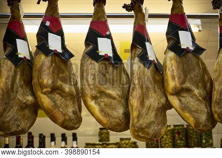 Spanish Ham Pieces In A Market. It Is One Of The Most Exported Spanish Products