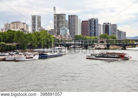 Paris City Modern Skyline With Beaugrenelle District And Pont De Bir-hakeim Bridge.
