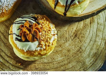 Happy Hanukkah And Hanukkah Sameach Is A Traditional Jewish Donut With Dulce De Leche And Chocolate.