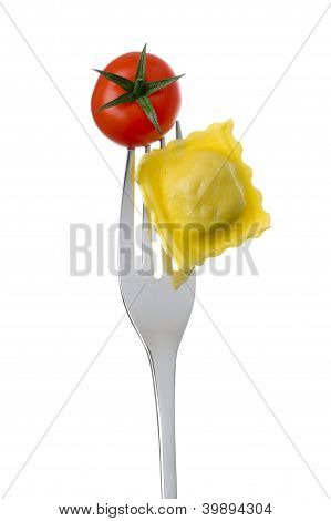 Ravioli And Tomato On A Fork Against A White Background
