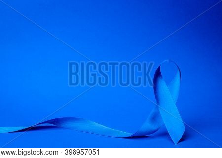 Blue Prostate Ribbon. Awareness Of Men Health In November With Blue Prostate Cancer Ribbon Isolated 