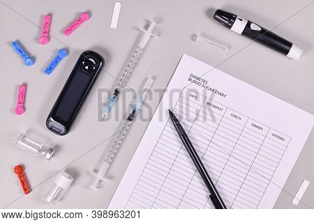Diabetes Blood Sugar Diary With Blood Glucose Meter, Lancets, Tests Stripes And Lancing Device On Gr