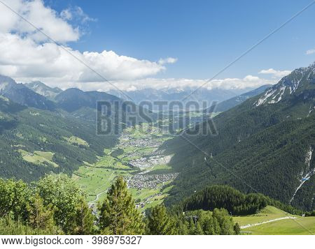 View Over Green Stubai Valley And Neustift Im Stubaital Village From Elferhutte With Moutain Peaks A