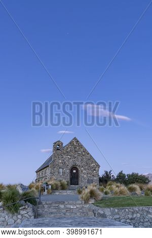 Historic Church Of Good Sheppard Famous Tourist Destination On Shore Of Lake Tekapo At Twilight In N