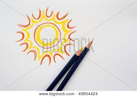 Hand Drawing Sun With Pencils