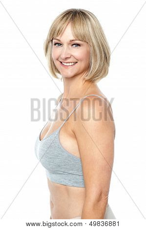 Stunning Model In Sports Bra Posing Sideways