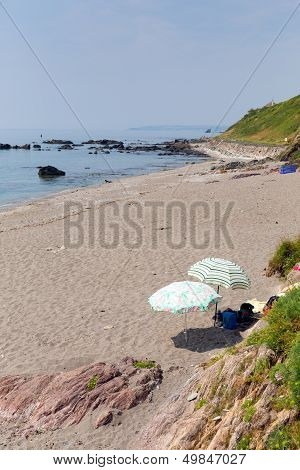 Umbrellas Portwrinkle beach Whitsand Bay near Looe Cornwall England United Kingdom