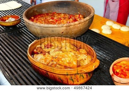 Food Is Served In Ceramic Pots