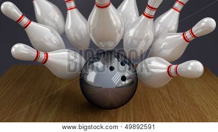 Bowling Ball And Pins On Moment Of Strike Impact