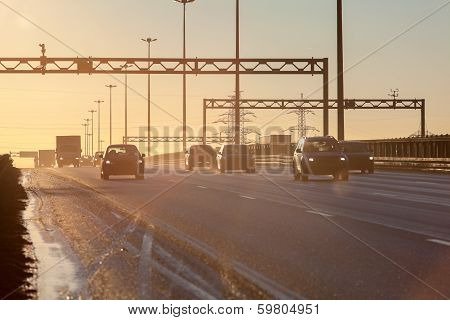 Highway Road With Cars Silhouettes During Sunset