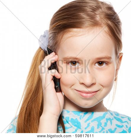 Girl, speaking on the phone. Child talking on mobile phone isolated on white backgraund