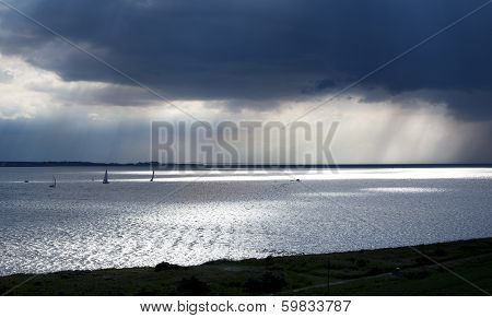 Boats Under Dark Sky