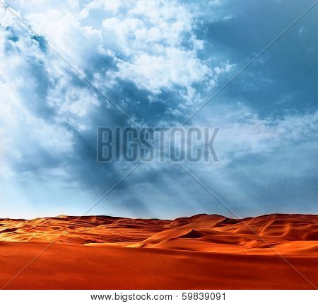 Beautiful landscape of Liwa desert, United Arab Emirates, Abu Dhabi, orange hot sand, blue cloudy sky, beauty of nature concept