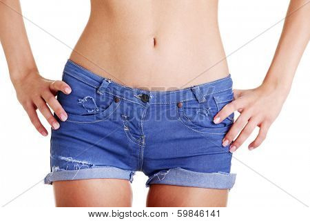 Fit woman in jeans shorts