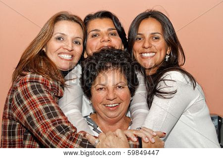 A happy family in a family hug moment.