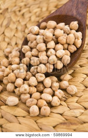 Dried White Chickpeas Ceci On The Wooden Spoon