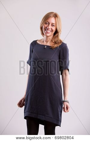 Real Woman Smiling And Standing Still