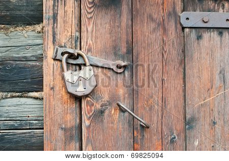 Old Wooden Door With Metallic Doorlock