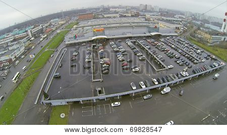 MOSCOW, RUSSIA - NOVEMBER 24, 2013: Parking near the Shopping Center Mall Gallery and Auchan hypermarket. Shopping Center opened July 28, 2005