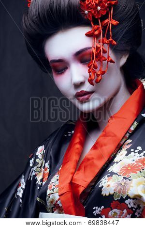 young pretty geisha in kimono