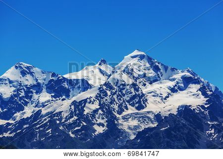 main Caucasian ridge at sunset.Tetnuld and Gestola peaks,Georgia