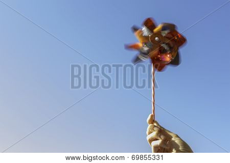 Hand Holding A Pinwheel