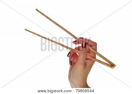 hand holding chopsticks