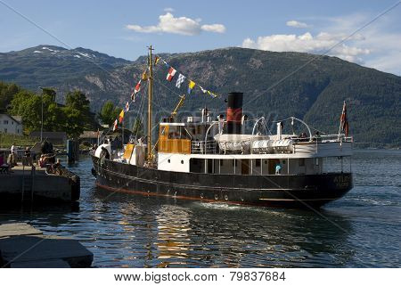 old passenger boat on hardangerfjord, norway