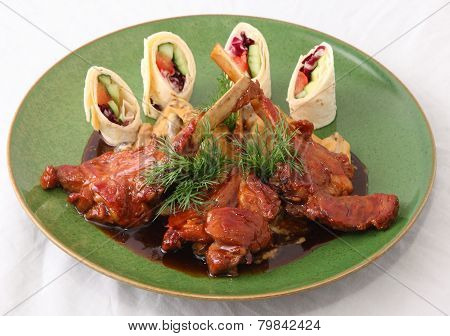 The Mutton Edges With Sauce And A Beater From An Unleavened Wheat Cake With Vegetables