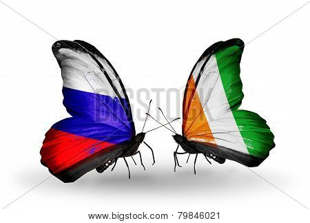 Two Butterflies With Flags On Wings As Symbol Of Relations Russia And Cote Divoire