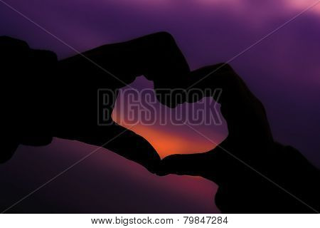 Heart symbol made with hands