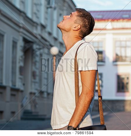 Guy Is Looking At Building