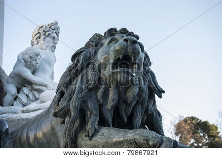 Bronze lion sculpture, oldest street in the capital of Spain, the city of Madrid