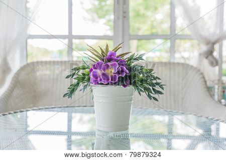 Flower In Vase On Table And Window Sill Background. Vintage Style Decorate