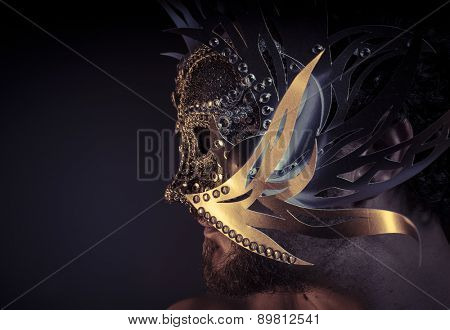 Gold, Treasure, jewels and silver. Man with mask of precious metals