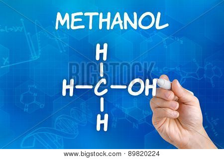Hand With Pen Drawing The Chemical Formula Of Methanol