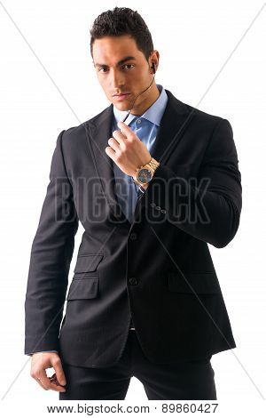 Elegant man ressed as bodyguard or security agent