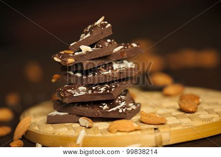 Dark brown chocolate and almonds with badam