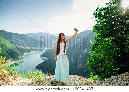 Happy Girl Taking Selfie Photo On Telephone