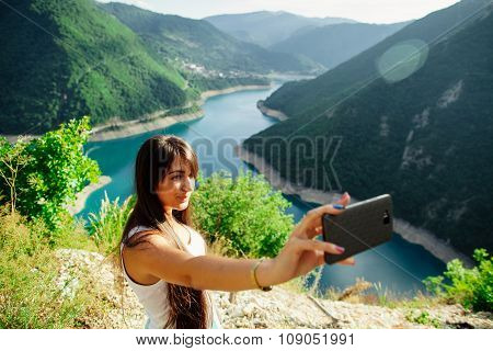 Happy Girl Taking Selfie Photo On Telephone
